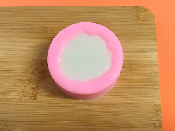 a silicone mould full to the rim with liquid soap