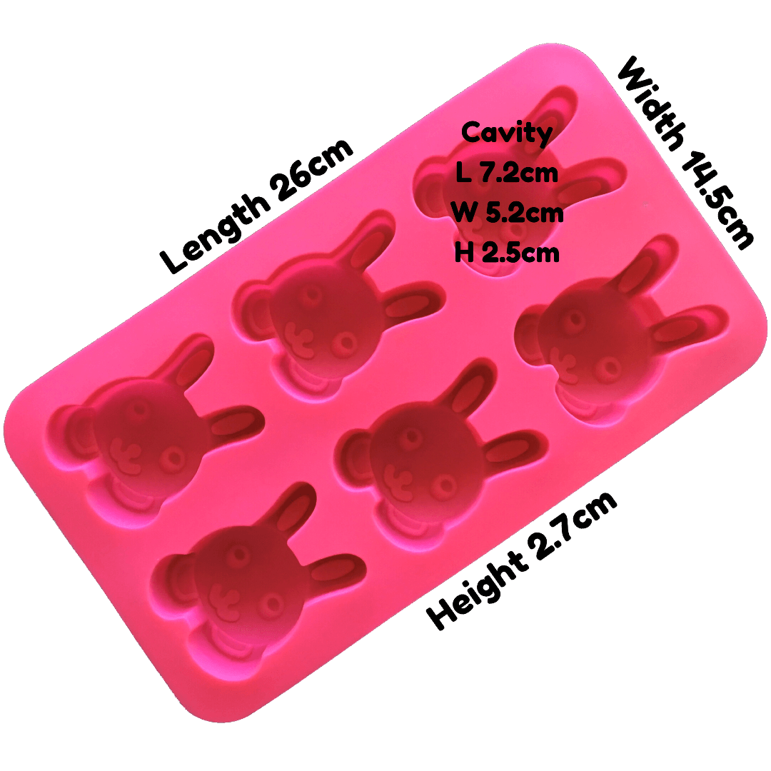 written dimensions of magenta coloured silicone mould with six identical bunny rabbit face cavities