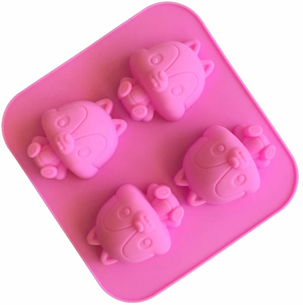 pink silicone mould with four identical cavities displaying a cartoon chipmunk