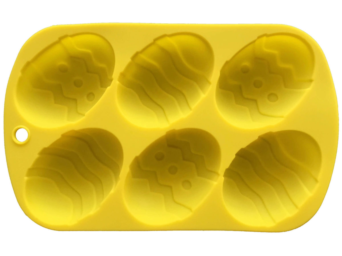 yellow easter egg silicone mould with six cavities and two different egg designs showing cavity details