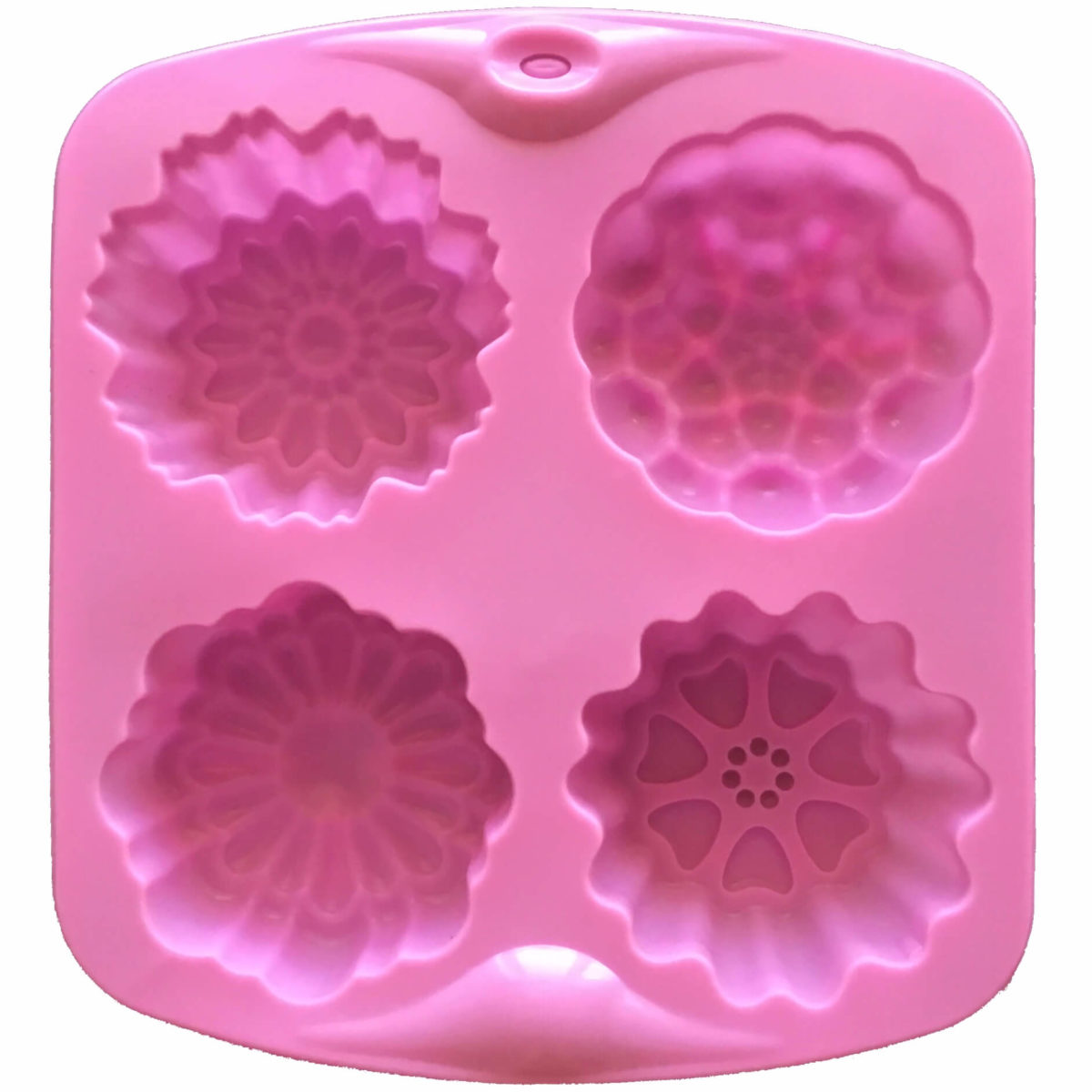 back of pink four cavity silicone mould with four individual floral designs showing individual mould cavity details