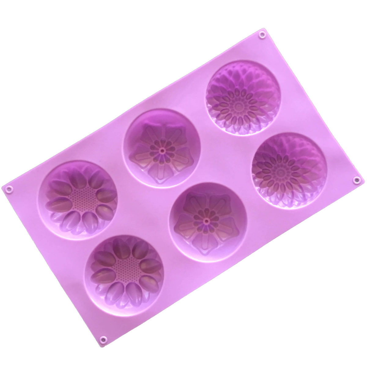 back of large purple silicone mould with six cavites - two each of dahlia, poinsettia and calendula flowers