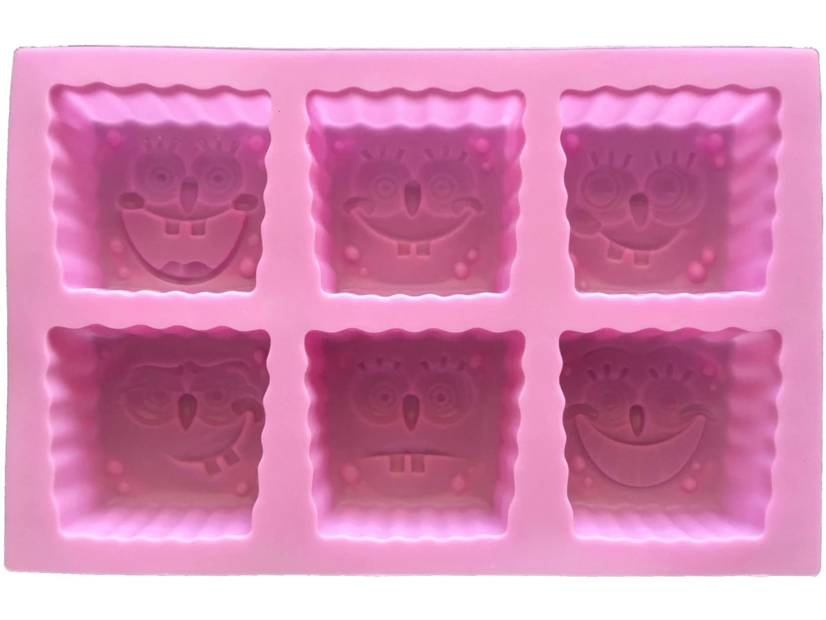 back of pink six cavity silicone mould with Sponge Bob head-shaped cavities each with an individual facial expression showing mould cavity details