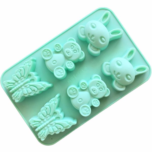 large aqua coloured silicone mould with six cavities - two each of bunny rabbit head, baby bear and butterfly