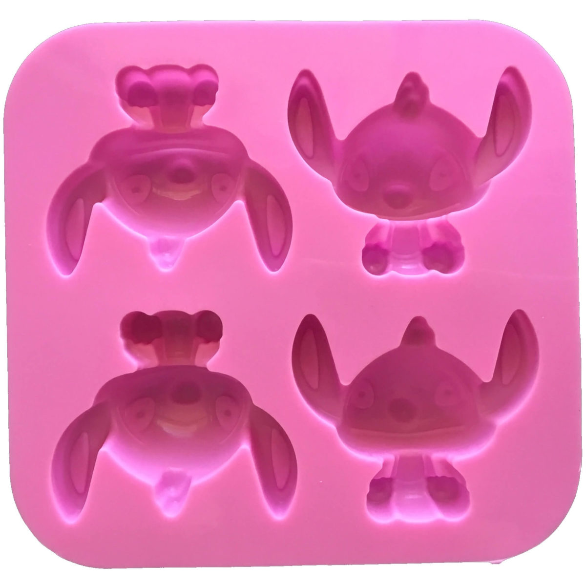 back of pink four cavity silicone mould with identical alien stich cavites showing mould cavity details