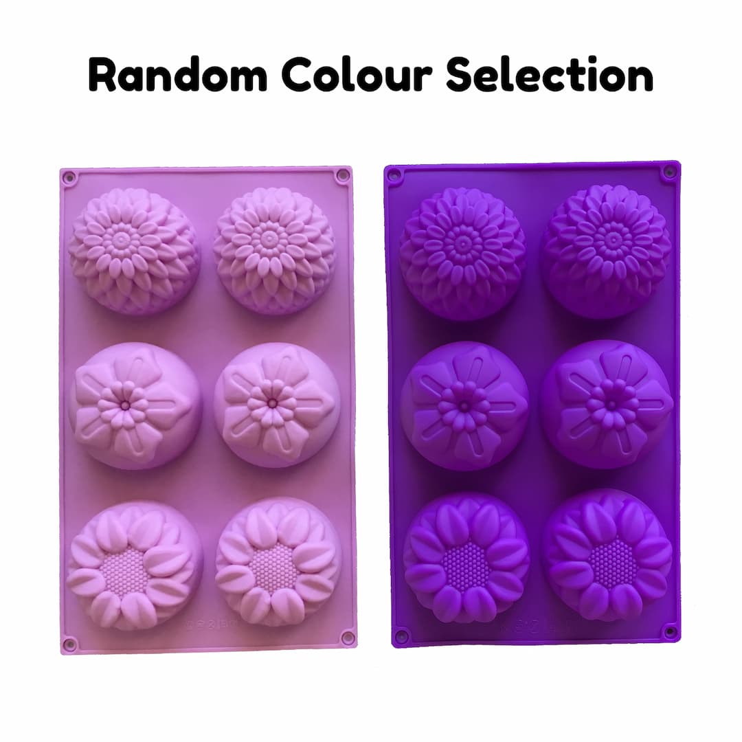 large silicone mould with six cavites - two each of dahlia, poinsettia and calendula flowers displayed in purple and pink with the text 'random colour selection'