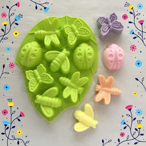 green insect leaf silicone mould with butterfly, ladybug, dragonfly and bee soap bars